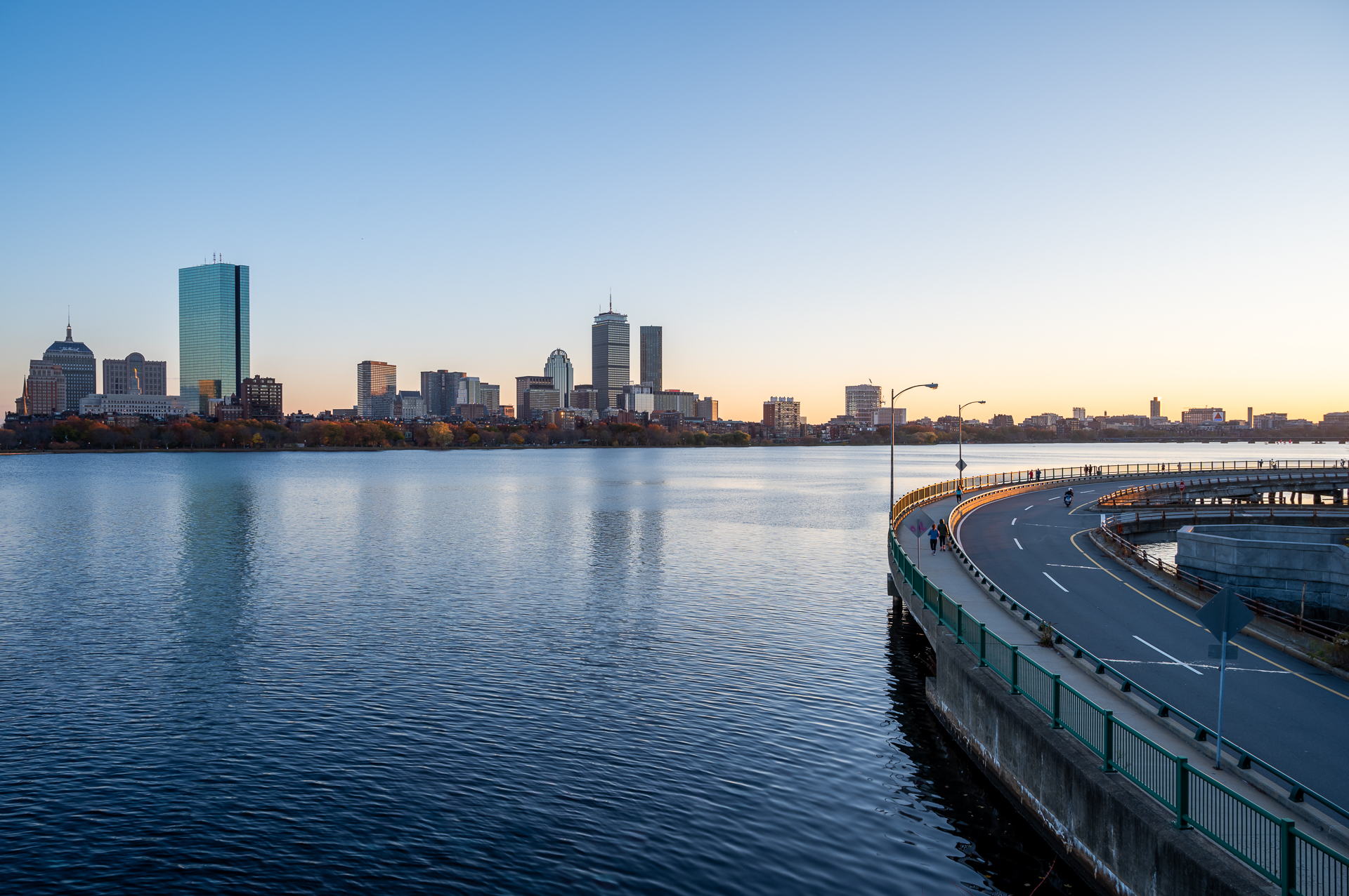 Boston skyline from Longfellow Bridge at sunset.