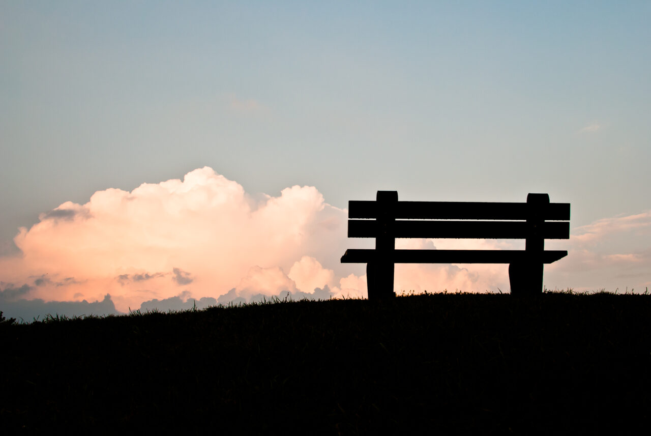 A bench overlooking the sky.