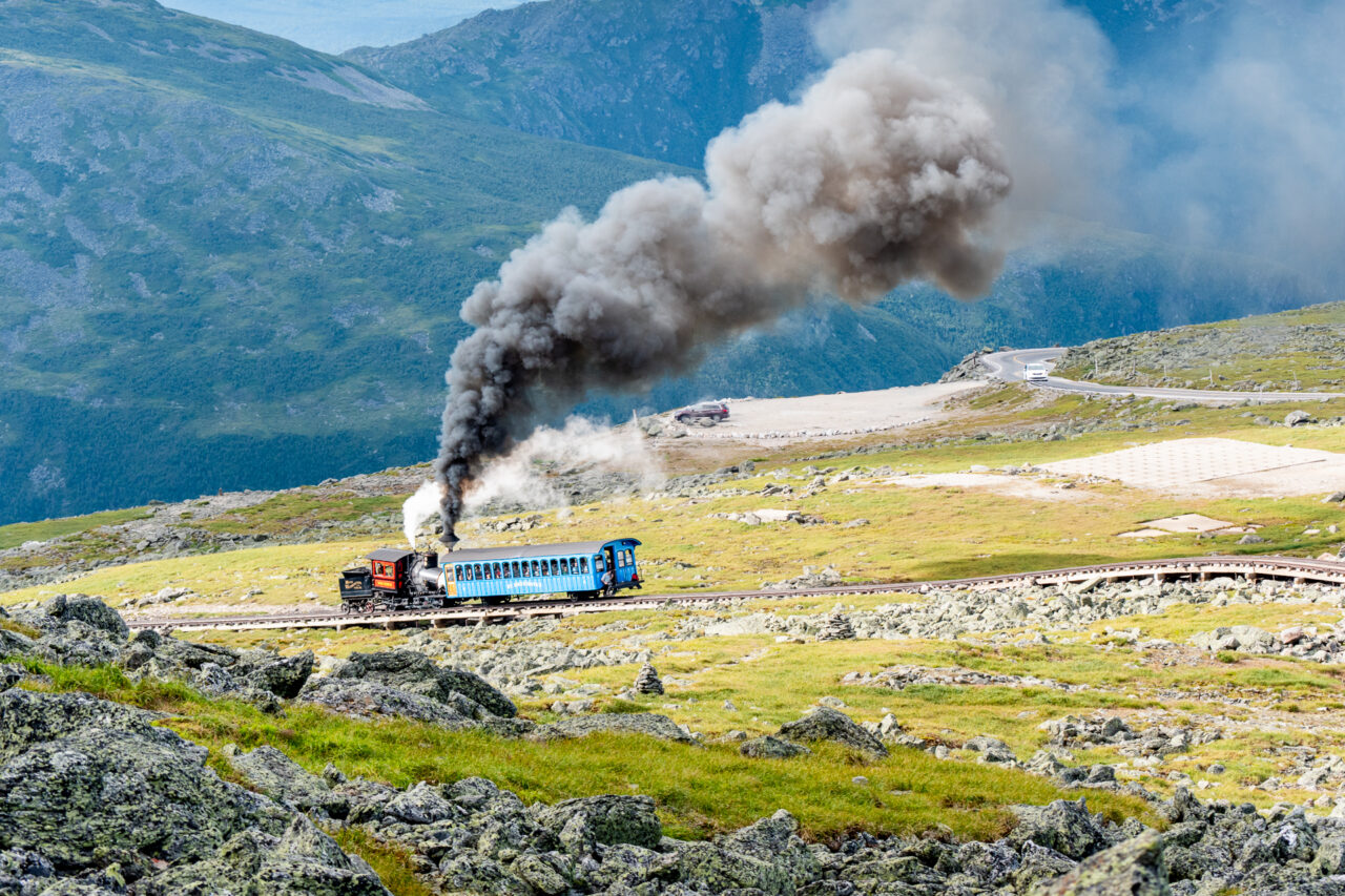 A Steam Locomotive pushing a rail car to the summit of Mount Washington.