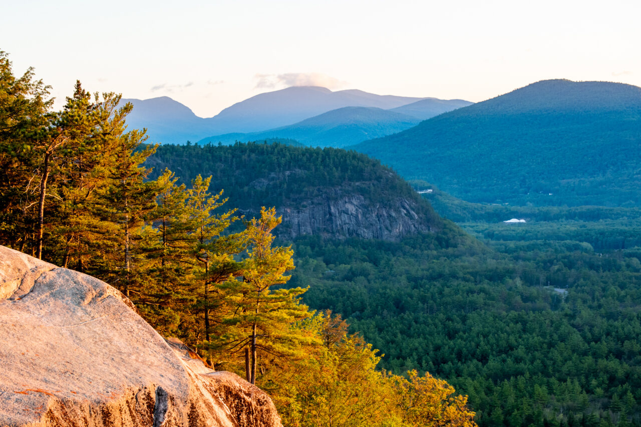 A view of Cathedral Ledge with the White Mountains in the background