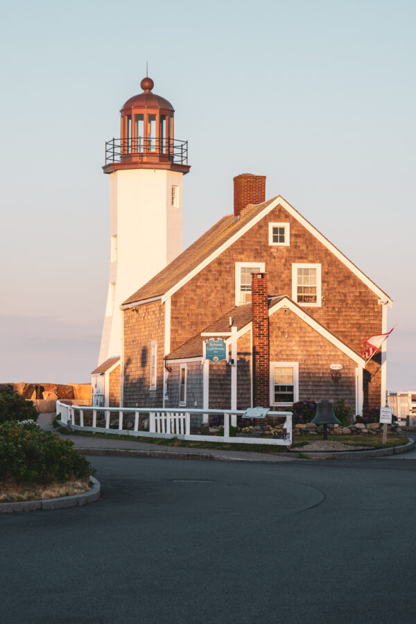 The Old Scituate Lighthouse, located in Scituate, Massachusetts, is a picturesque sight at sunset.