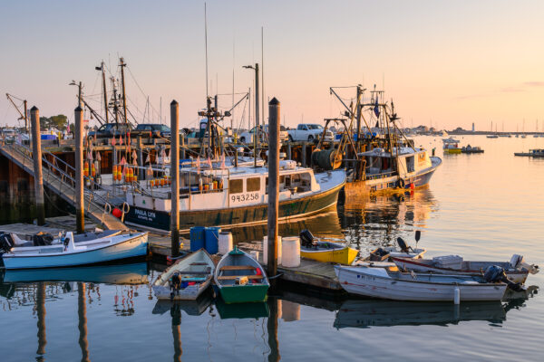 Boats at the Scituate Harbor docks in the early morning light.