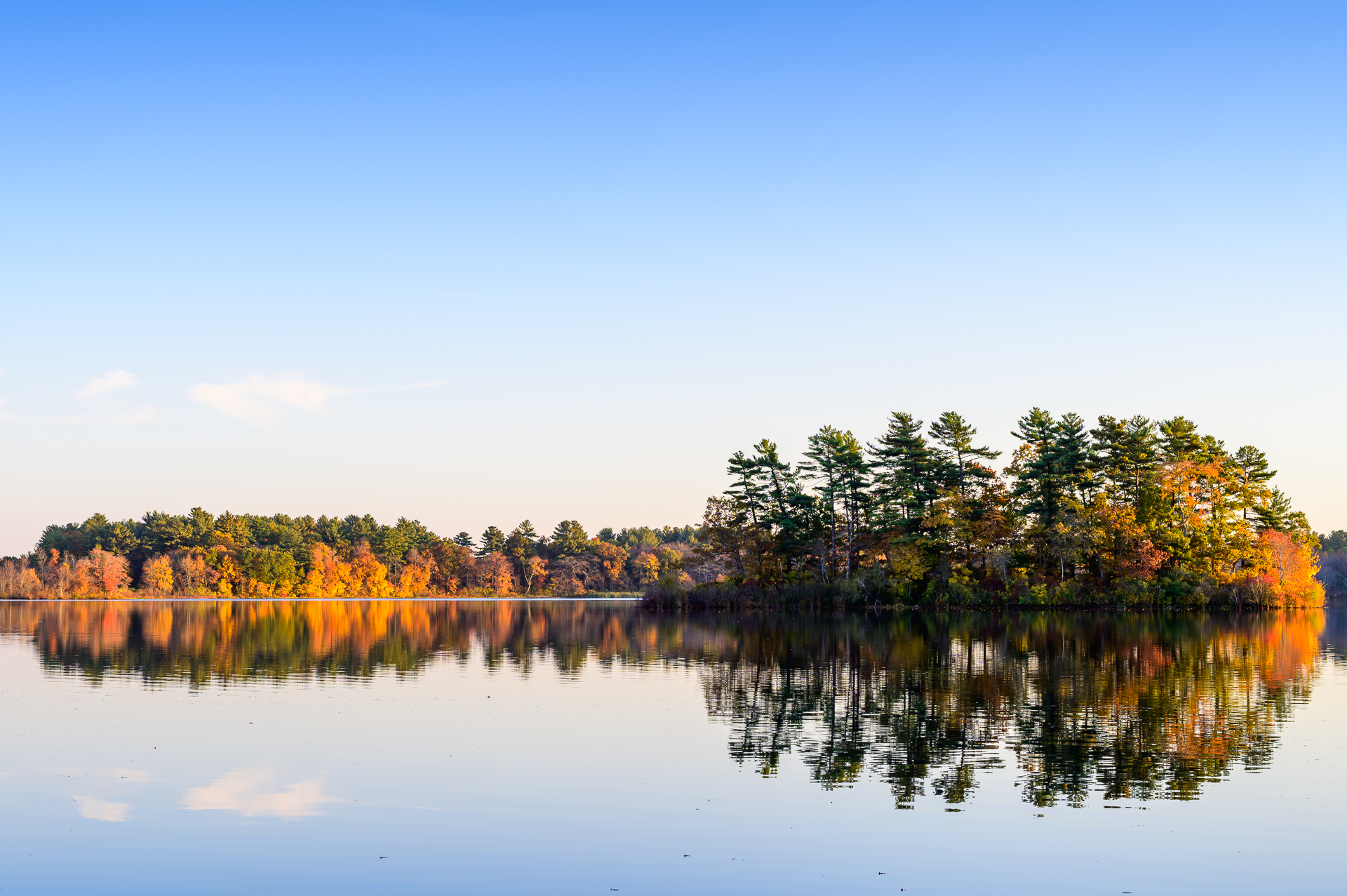 Autumn colors reflected on Robbins Pond in East Bridgewater, MA.