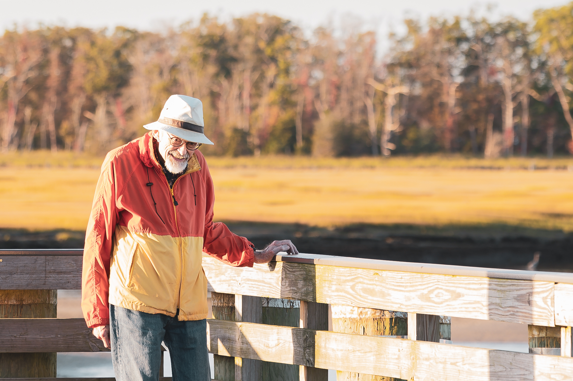 A man enjoying the sun during a golden hour stroll.