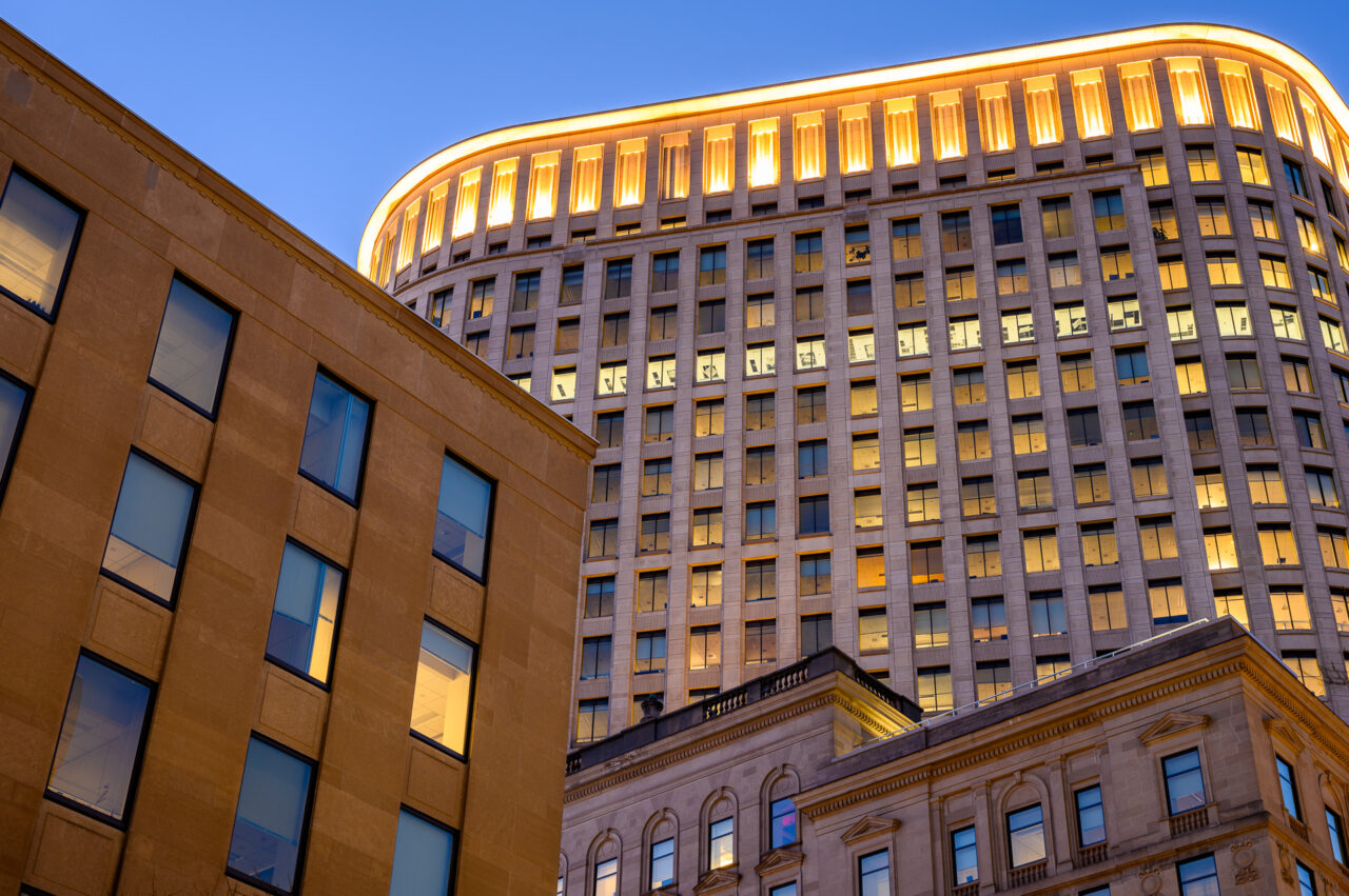A close of of three distinct architectural layers in the city of Boston.