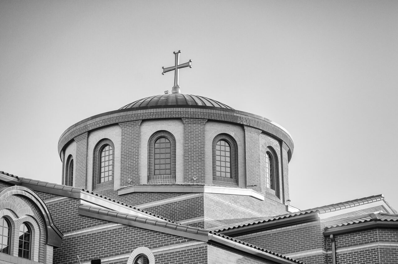 A close up view of the dome at Saint Catherine Greek Orthodox Church in black and white.