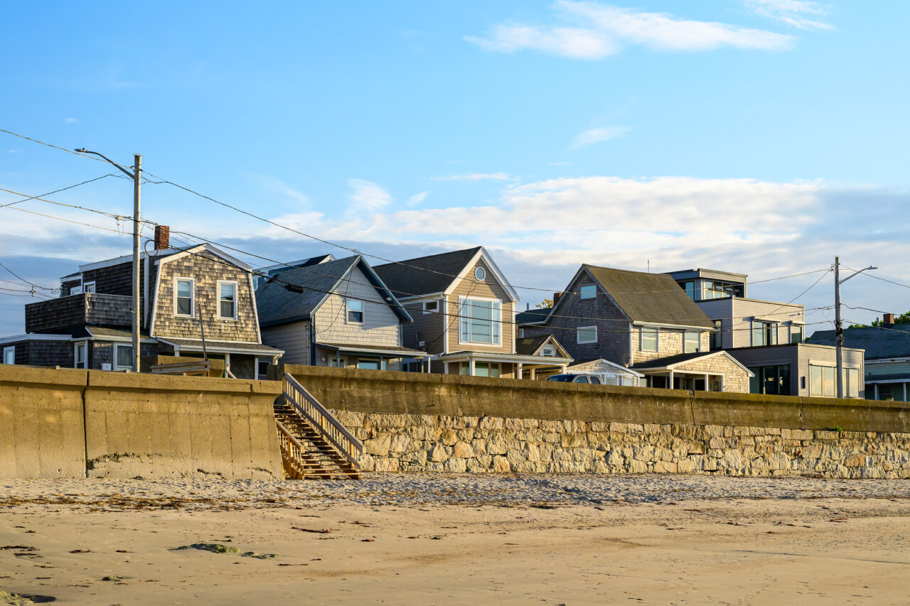 A set of stairs leads up to a row of houses overlooking Gunrock Beach.