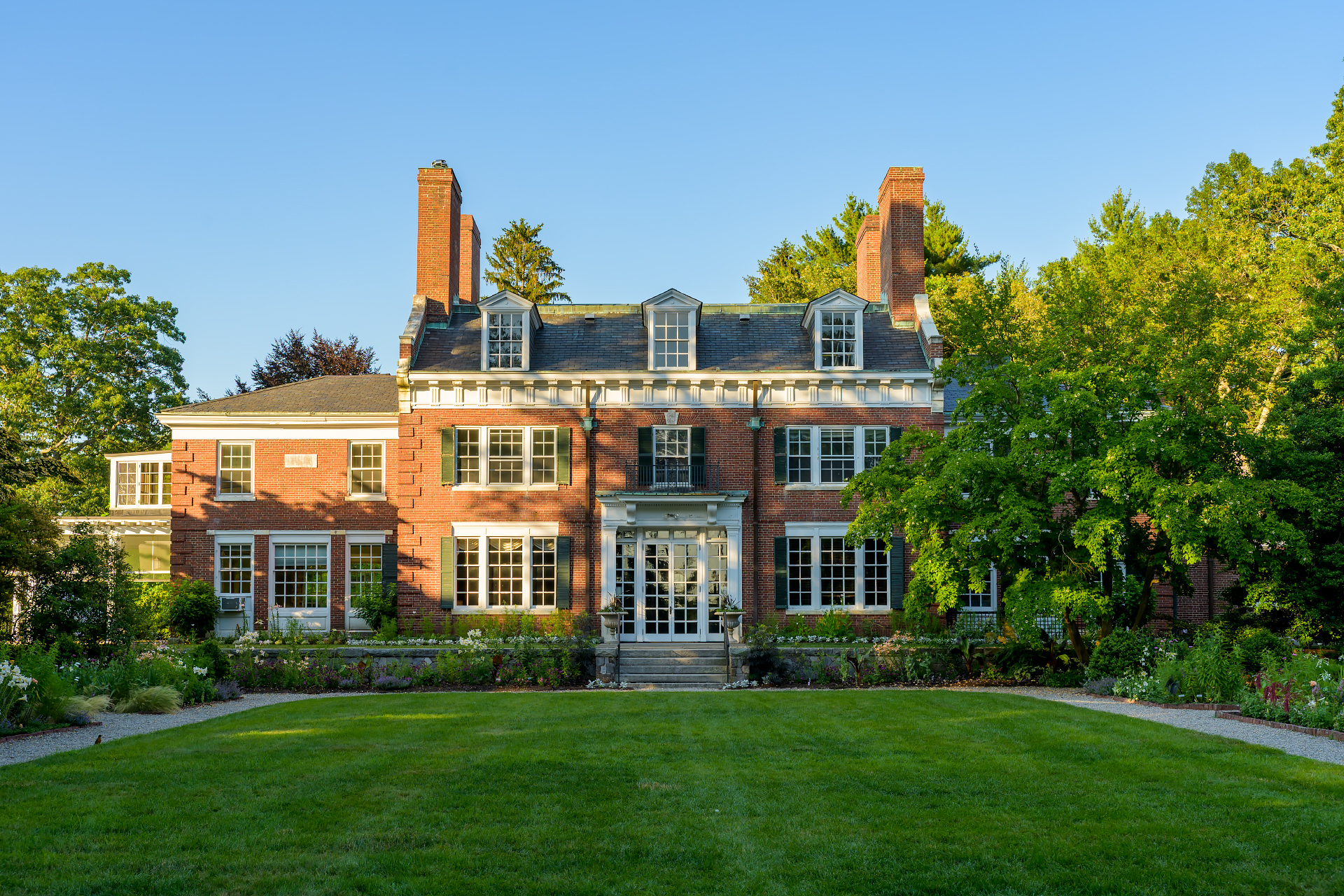 The impressive brick rear facade of The Bradley Estate in Canton, Massachusetts.