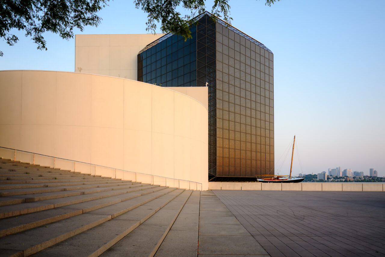 Rear view of the JFK Library and Museum in Boston during sunrise.