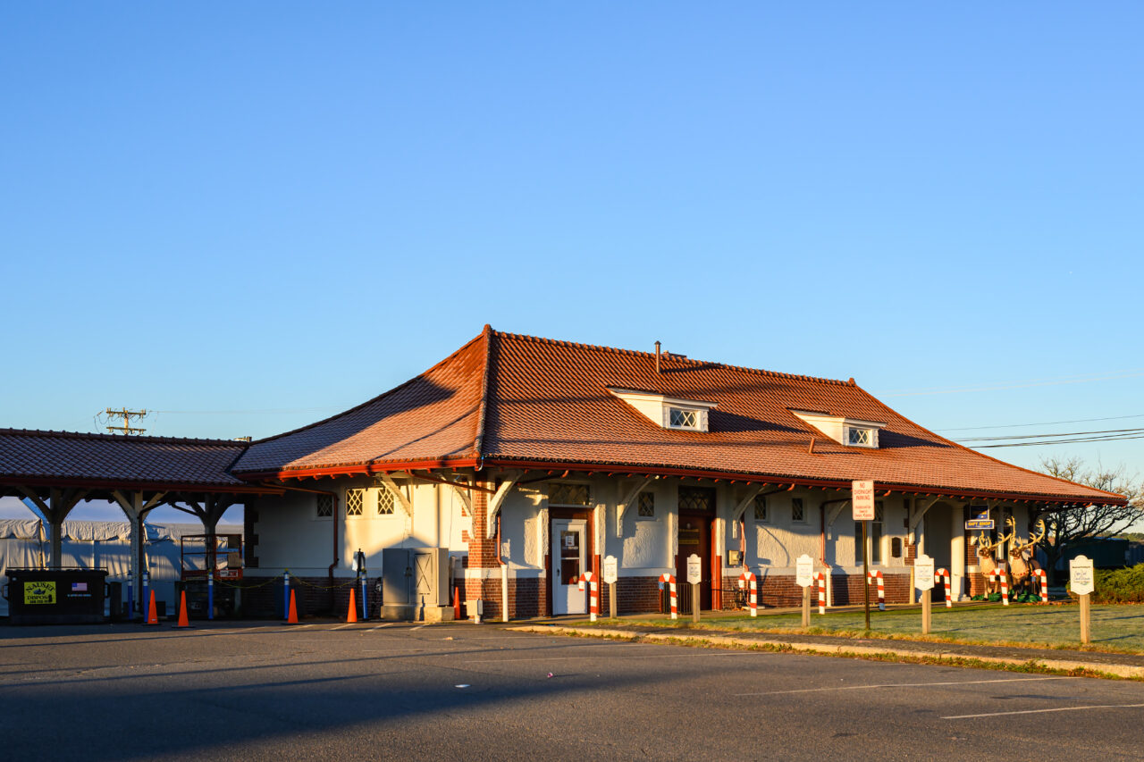 The historic train depot building is shown in the early morning light at the Buzzards Bay Recreation Area.