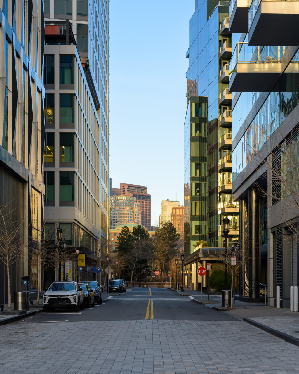 A rare view of an empty, quiet street in the Boston Seaport District during the solstice morning.