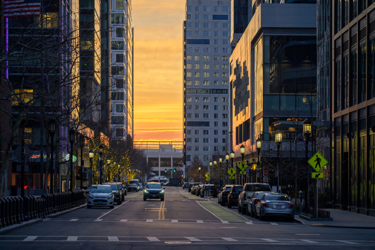 Morning light stretching across Northern Avenue in the Seaport District during the solstice.