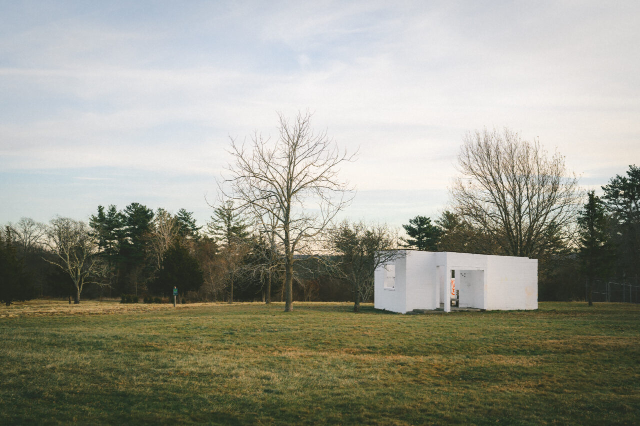 A frozen field at Turkey Hill leading to the old NIKE anti-missile site building.