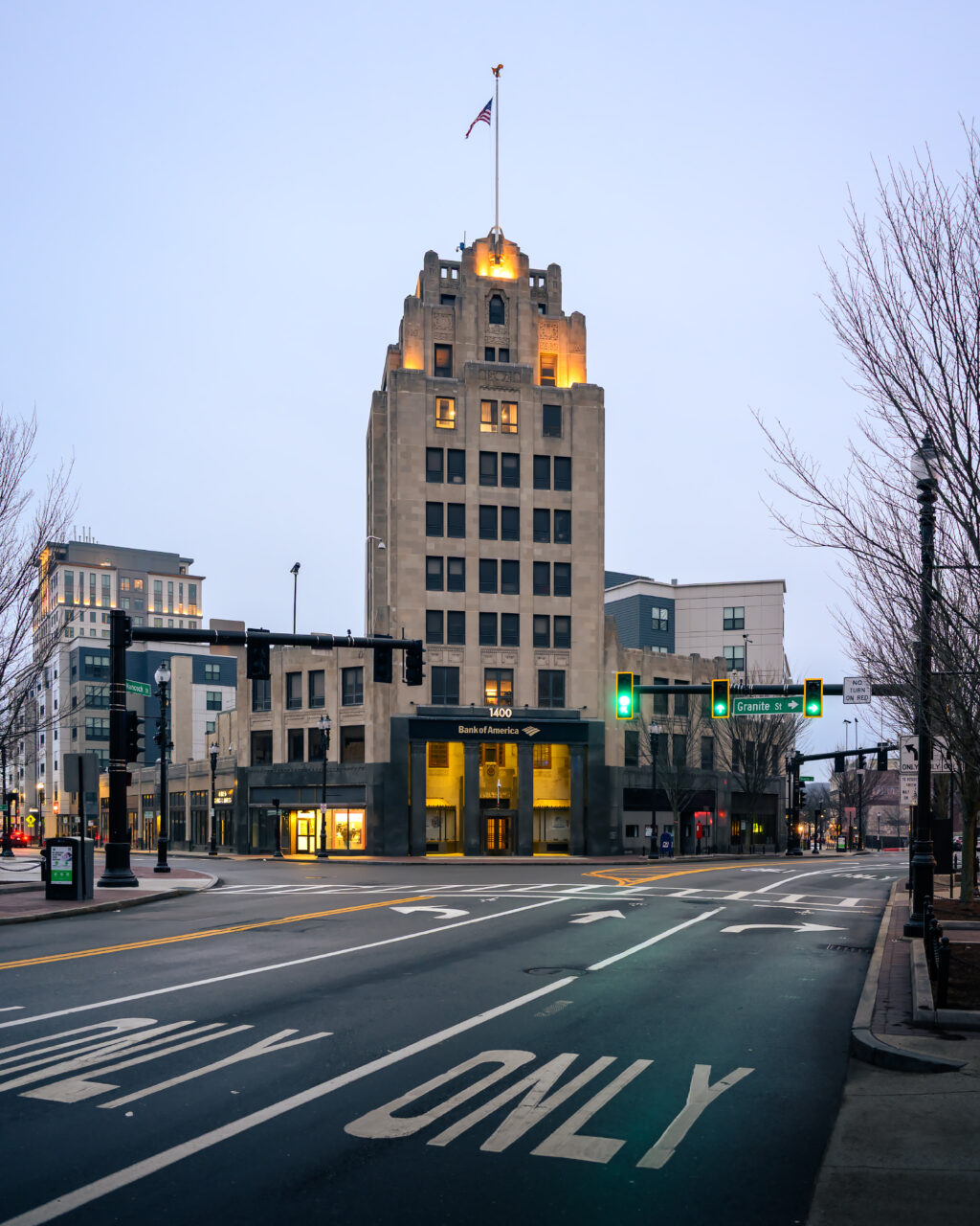Early Hours in Quincy Center showing empty sidewalks along Hancock Street at dawn.