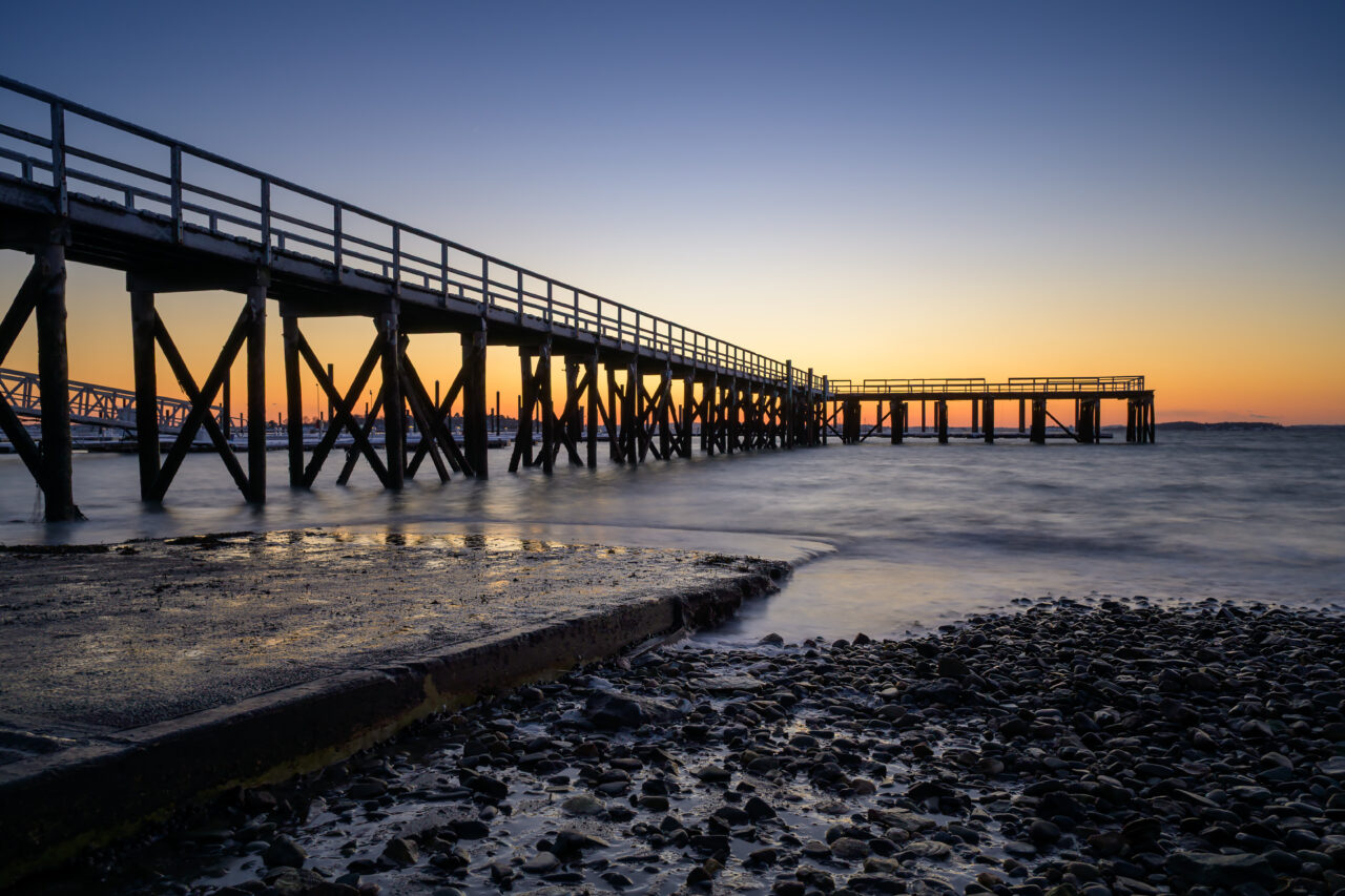 A long exposure of A Street Pier at twilight. 