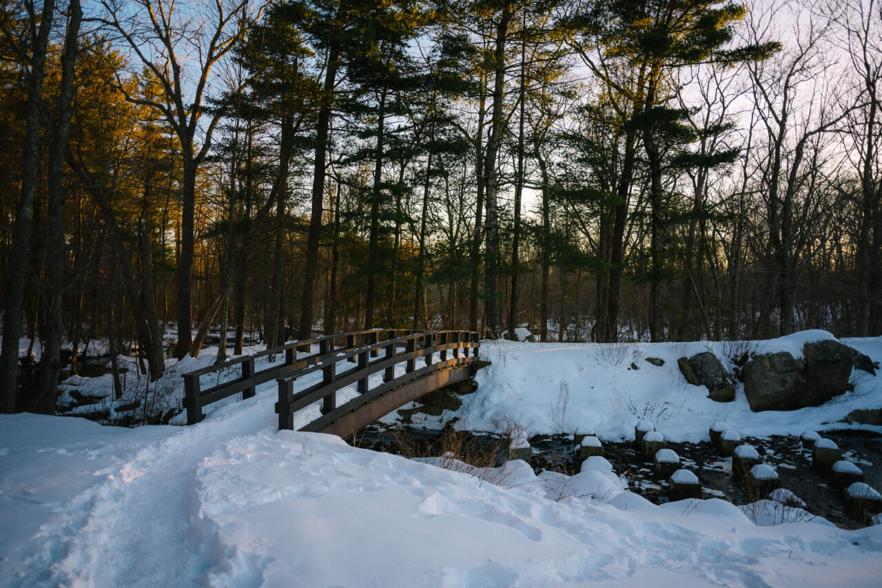 A lonely bridge over the spillway at Ames Nowell State Park.