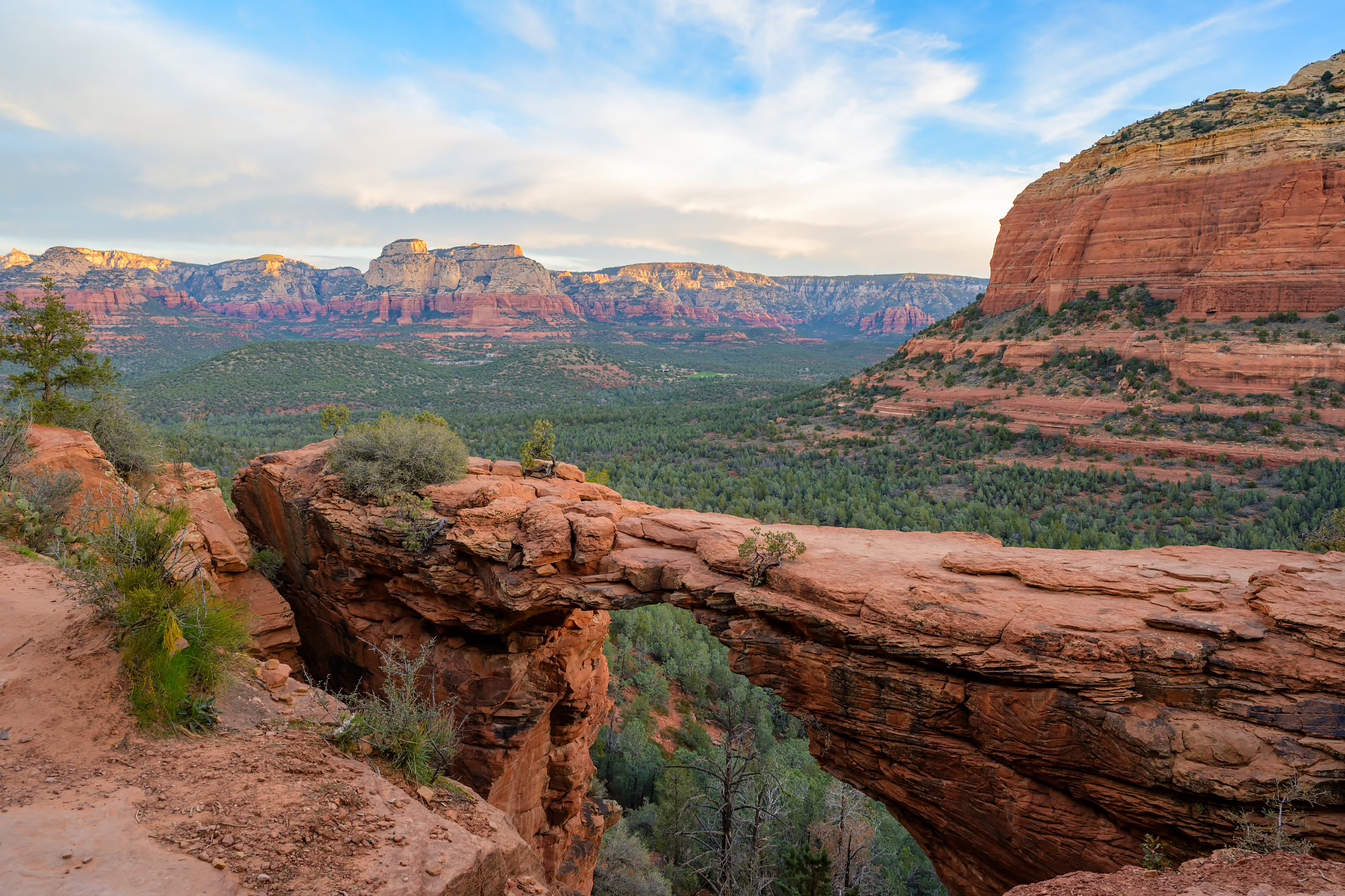 Natural sandstone arch of Devil’s Bridge overlooking the Sedona Valley in Arizona.