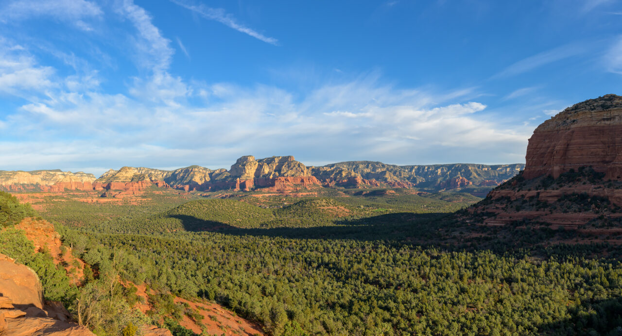 Panoramic valley view from Devil’s Bridge at sunrise in Sedona, Arizona.