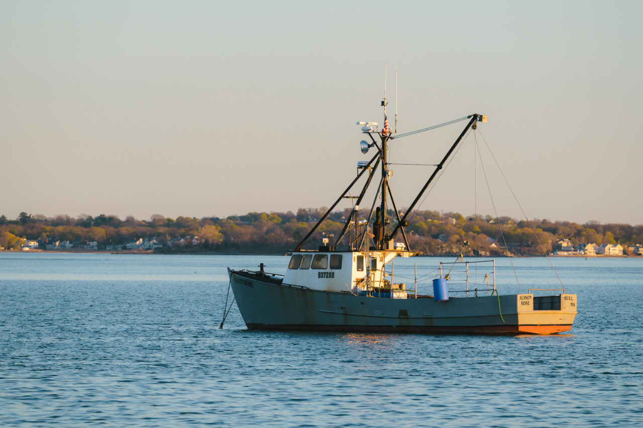 The fishing vessel Alison Rose moored at sunset in Hull Harbor.